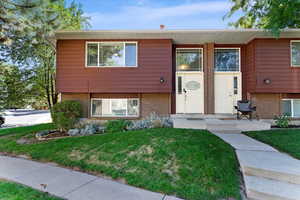 View of front of house featuring a front lawn