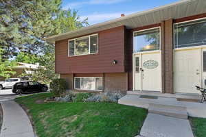 View of front of property with a front lawn