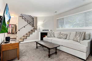 Living room with carpet floors