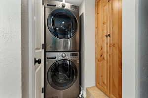 Washroom with stacked washer / dryer