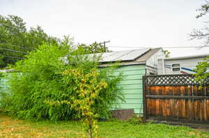 Approximately $30 K of solar panels installed on garage roof.