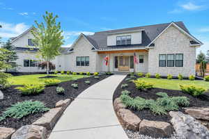 View of front facade with a front yard