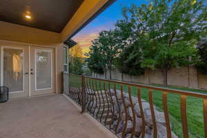 Balcony at dusk with a patio