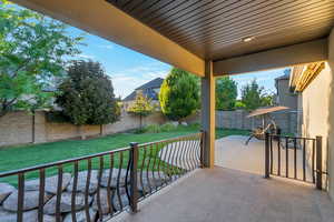 Covered patio and uncovered patio with awning