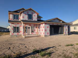 Unfinished property with covered porch