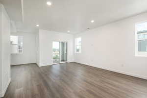 Unfurnished room featuring hardwood / wood-style flooring