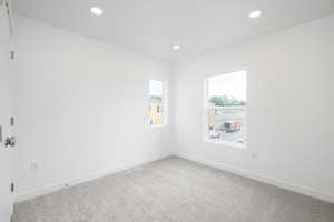 Empty room featuring carpet floors