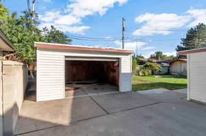 Garage with a lawn