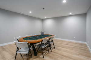 Dining room with light hardwood / wood-style flooring