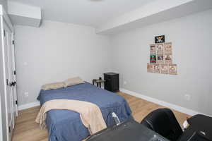 Bedroom with light wood-type flooring