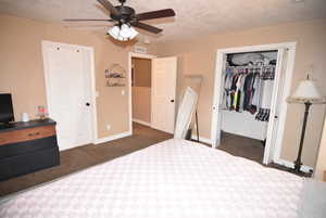 Owner's suite showing door to bathroom, hallway and walk-in closet