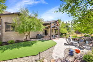 View of yard featuring a patio area and an outdoor hangout area