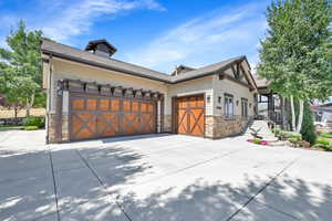 View of front of property featuring a garage