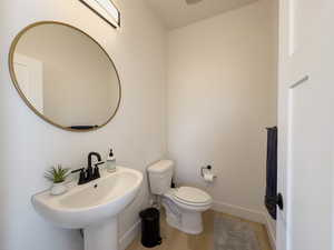 Bathroom with sink and toilet