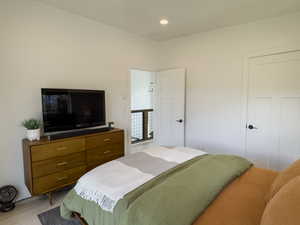 Bedroom with light wood-type flooring