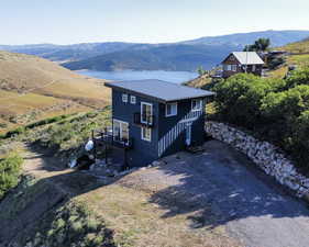 Exterior space featuring a mountain view and a balcony