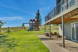 View of yard with a playground