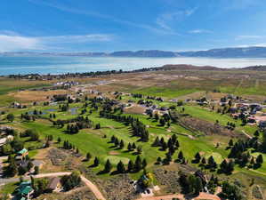 Aerial view featuring a water and mountain view