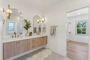 Bathroom featuring hardwood / wood-style floors and vanity