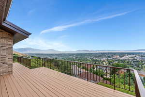 Wooden deck featuring a mountain view