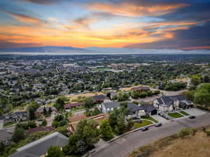 Aerial view at dusk featuring a mountain view