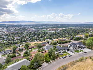 Birds eye view of property with a mountain view