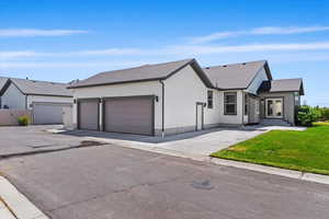 View of front facade featuring a garage