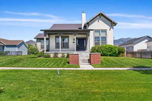 View of front facade with a front lawn