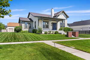 View of front of home with a front lawn