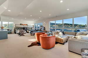 Living room featuring light colored carpet