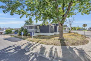 View of front of home featuring a front lawn