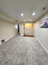 Basement with carpet