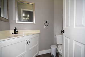 Bathroom with vanity and toilet