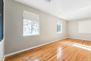 Empty room with light wood-type flooring