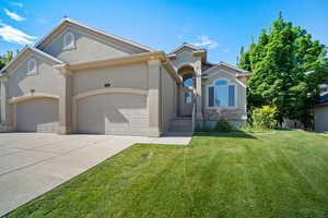 View of front of house with a front lawn