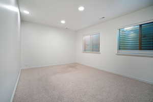 Unfurnished room featuring carpet floors