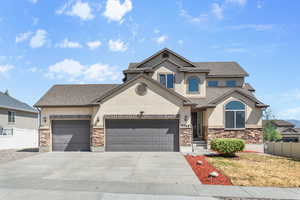 View of front of property with a garage