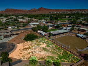 Birds eye view of property with a mountain view