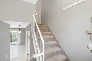 Stairs with tile patterned flooring