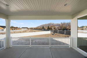 View of patio / terrace featuring a mountain view