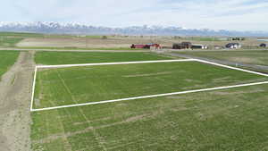 View of sport court featuring a rural view and a mountain view