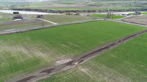 Aerial view featuring a rural view and a water view