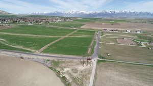 Aerial view featuring a rural view and a mountain view