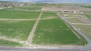 Birds eye view of property featuring a rural view