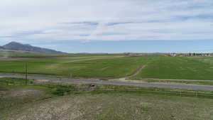 Property view of mountains with a rural view