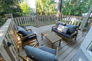 Wooden terrace with an outdoor living space