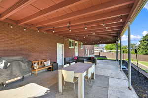 View of patio featuring an outdoor hangout area