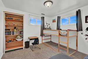 View of carpeted bedroom