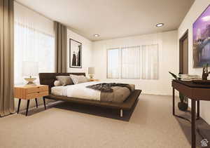 Carpeted bedroom featuring multiple windows