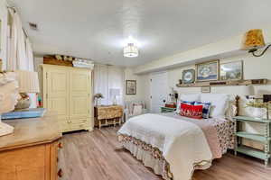 Bedroom featuring light hardwood / wood-style floors